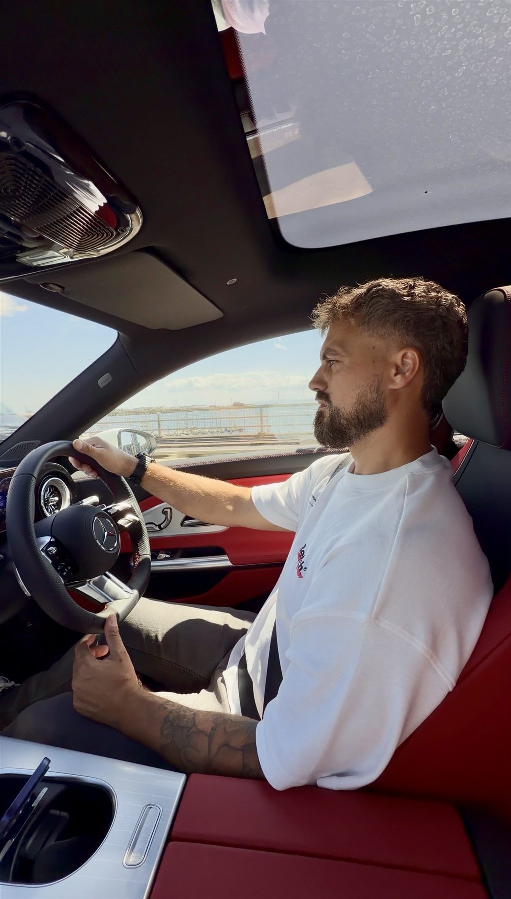 Josh Llewellyn-Jones driving a Mercedes
