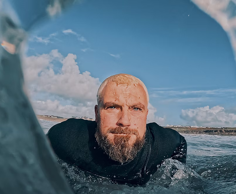 Josh Llewellyn-Jones in the sea during an outdoor challenge